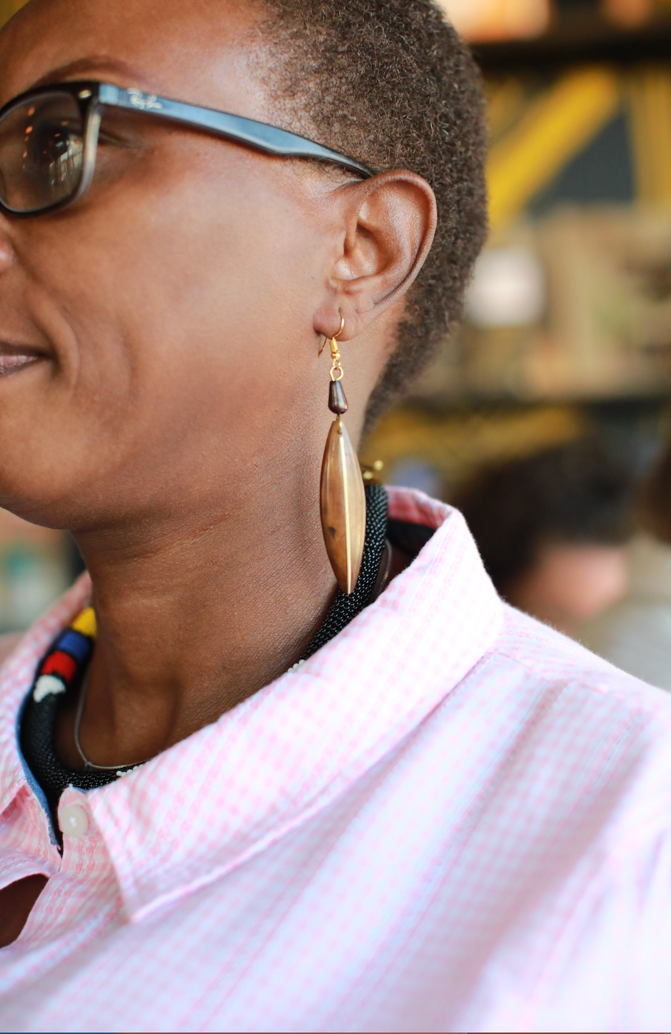 Woman wearing Sheba Earrings